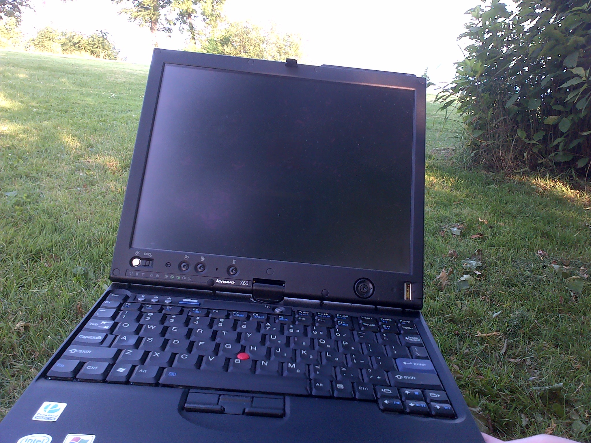 With my ThinkPad X60 in the park, my "office" today.